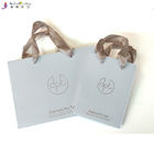 Biodegradable Ribbon Handle Shopping Bags Custom Printed Paper  Glossy Lamination